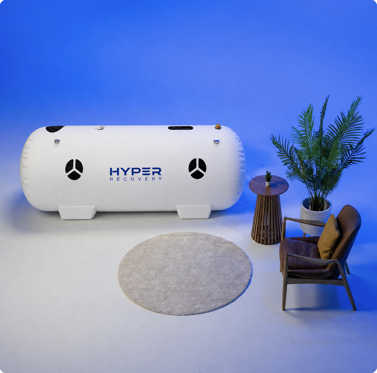 HyperRecovery Lay 1.5 soft hyperbaric chamber set up in a living room